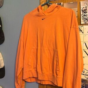 Orange Nike cropped sweatshirt